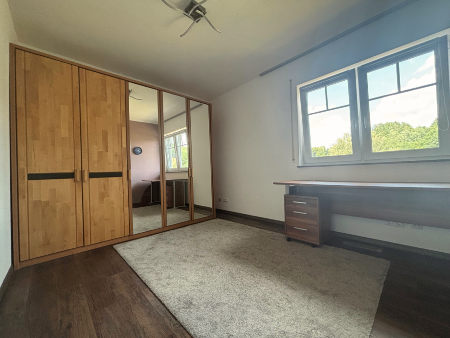 Schlafzimmer 3 1. OG Einfamilienhaus Neuenrade