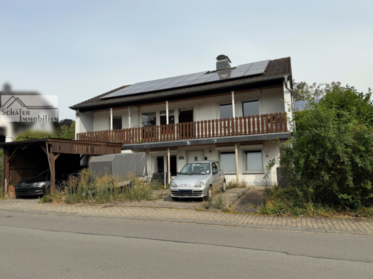 Hausansicht Neuenrade Einfamilienhaus Einfamilienhaus mit Apartment im Souterrain in bester Wohnlage von Neuenrade